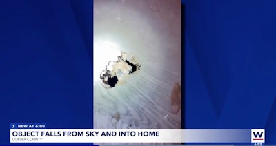 This image from news outlet WINK shows the hole int he flooring caused by the object from space.