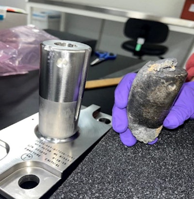 This image from NASA shows the recovered object, right, next to an intact stanchion, left.