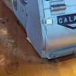 Here, I purposely hooked up a vacuum that was too small to the big machine to show the heavier particles you can get spitting out. This can also happen when running with a canvas bag that is too full.
