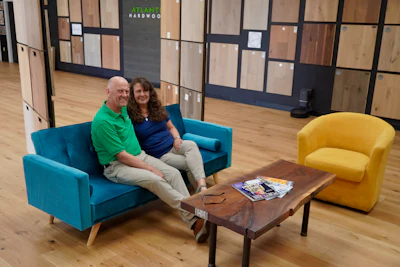 Jack and Kathleen McInerny pose in Atlantic Hardwood's showroom.