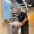 Mark Maly tries out the new flooring Kiosks in Sergenian's.