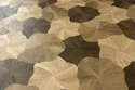 'Blooming' wood floor design is achieved by installing four unique shapes in a random pattern to generate a non-repetitive design.