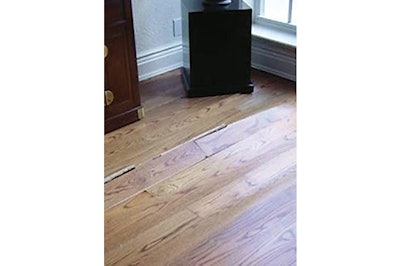 Buckling is an example of a serious moisture issue that often could have been avoided with acclimation before installation.
