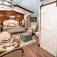 Barnwood Village cabins include flooring from the AHF 'Barnwood Living' line.
