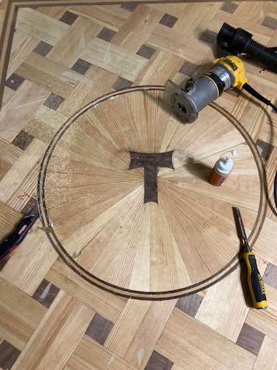 Patrick Russell included a circular sunburst with the homeowners' last name initial.