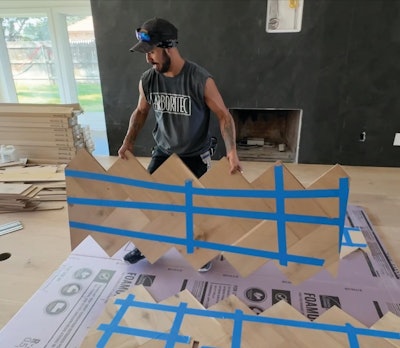Panelizing sections of herringbone makes it easy to template out areas for cuts around jambs, toe kicks and other cutouts.