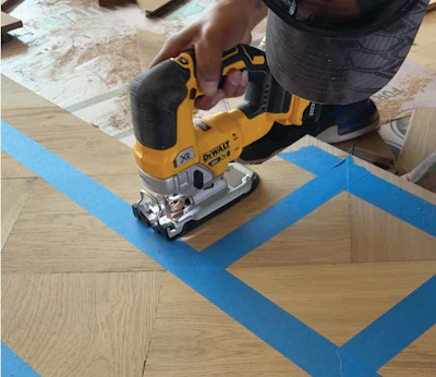 Cuts can be done on top of the foam board: a track saw for straight cuts and a jigsaw for complicated shapes.