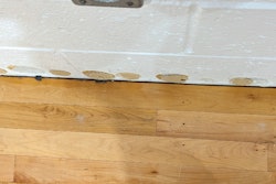 When gym flooring is tight against the walls, either there wasn’t enough expansion space to begin with, or site conditions have caused the flooring to swell.