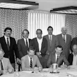 At this meeting in St. Louis in December 1985, the National Wood Flooring Association was officially created. Seen are (seated, left to right): Jack Wilcox, H.G. Roane Company; Ralph Singer, Diamond W Supply; Lon Musolf, Lon Musolf Distributing; Roland Holder, Gentry & Holder Floors; Harold Reid, Trinity Floor Company; (standing, left to right): Gary Reynolds, Galleher Hardwoods; Steve Brown, Swift-Brown Distributors; Art Pedicini, Geysir Sales Corporation; Jack Coates, Golden State Flooring; Richard Steeneck, Hoboken Wood Floors; Virgil Hendricks, Mid-West Floor Company; Eldon Robbins, Mid-West Floor Company; and Keijo Hyvonen, Kelly-Goodwin Company.