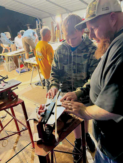 Russell and son Zane at DM Hardwood Designs class in Ocala, Fla.