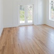 Brown Oaks Flooring co-owner Ashley Do Carmo favors earth-tone wood floors.
