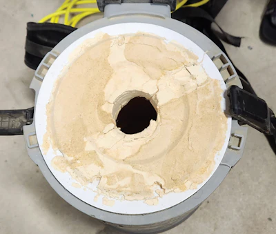 This backpack vac was never emptied while doing an entire gym, and, not surprisingly, the new motor stopped working.