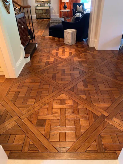 Included in Chuck Crispin's inventory sale are 84 panels (about 900 square feet) of this walnut Versailles parquet.