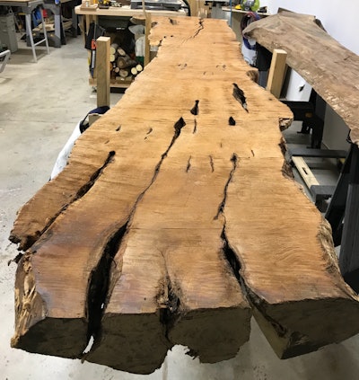This mesquite slab (5 inches thick, 26 inches wide and 144 inches long) is one of many slabs included in the sale.