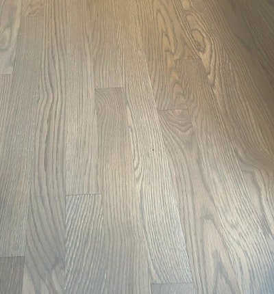 Consistency in finish application is critical when avoiding tannin pull on a floor such as this white oak.