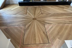 Justin Boone used LED light inlays to frame the flooring designs.