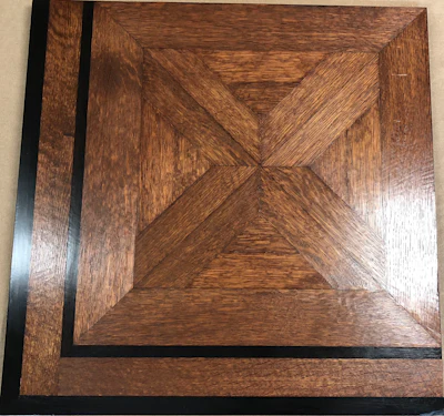 Luxembourg parquet in white oak with an ebony feature strip.