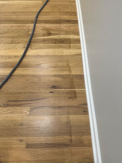 Tannin pull—noticeable as what looks like darker stop marks on this floor—can be avoided with the right products and precautions.