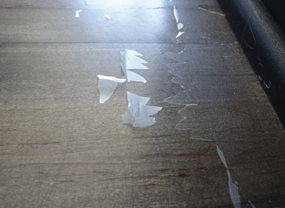 Doing a test area before recoating can help prevent problems like the peeling finish on this wood floor.