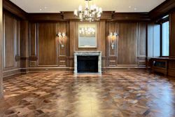 Hand-scraped engineered black walnut fills this Chicago apartment.