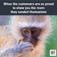 Vervet monkey looking skeptical with hand over mouth, meme-style workplace humor