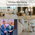 PID Floors receives sustainability award, showcasing elegant interior design and award trophy