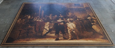 The completed 'Night Watch in Wood' measures nearly 4 by 5 meters, is composed of 195,000 wooden pixels, each measuring 1 centimeter square, and is crafted from 45 species and 52 colors.