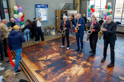 Musicians perform on “The Night Watch in Wood” at its premiere at Amstel Station in Amsterdam.