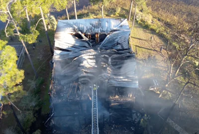 An overhead view of the destruction of the Oak Island, N.C., home after the fire caused by spontaneous combustion from rags soaked with oil-based stain.