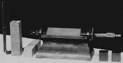 A traditional experimental setup to measure dimensional change with changes in moisture content in wood.