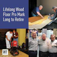 Wood floor professionals working with equipment and collaborating at trade event