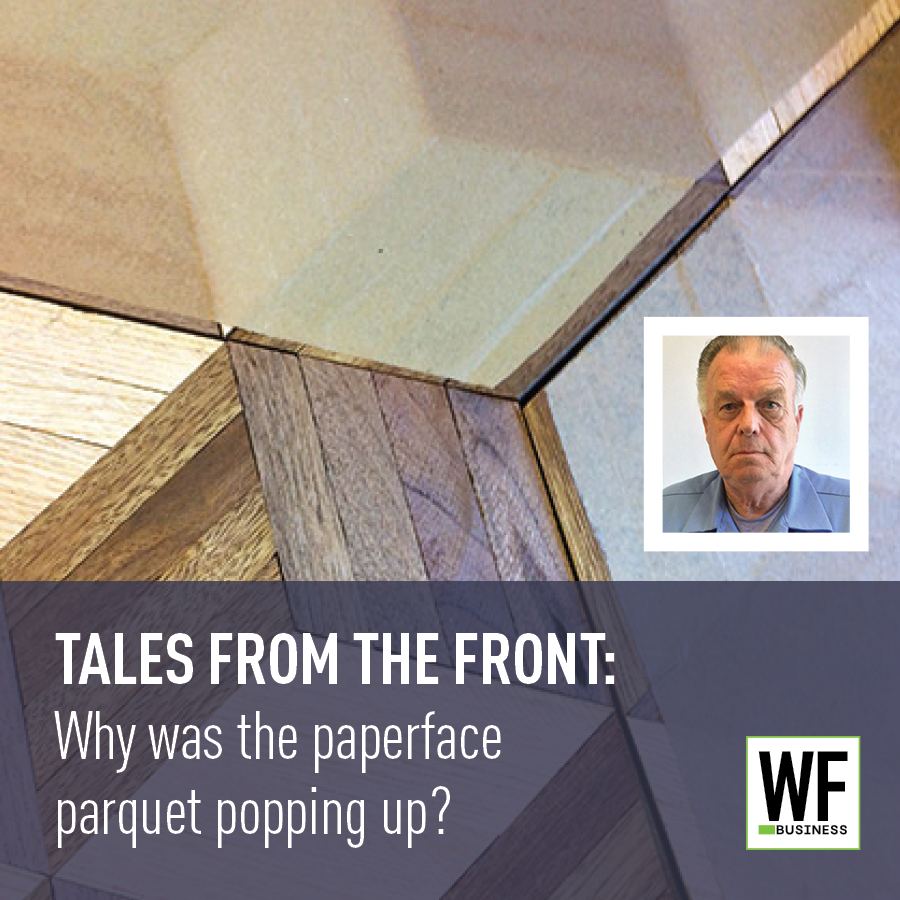 Parquet flooring detail with WF Business logo, investigating floor surface issue