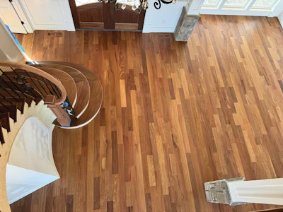 A cumaru floor by McCullen’s Wood Flooring. “The milling was phenomenal, so it didn’t take much to get it tabletop flat,” Eli McCullen says. It was coated with Loba EasyFinish.