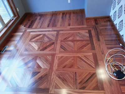 Wood floor pro Andrew Castona of Sunrise Flooring installed this prefinished Patagonian rosewood in his office 17 years ago. He reports that the floor has darkened only slightly over that time.