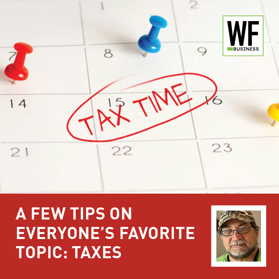 Calendar with tax time reminder circled in red, push pins, and WE Business logo