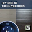 Nest thermostat displaying 57 degrees on light wood floor next to dark hardwood floor, illustrating indoor air quality effects on wood flooring