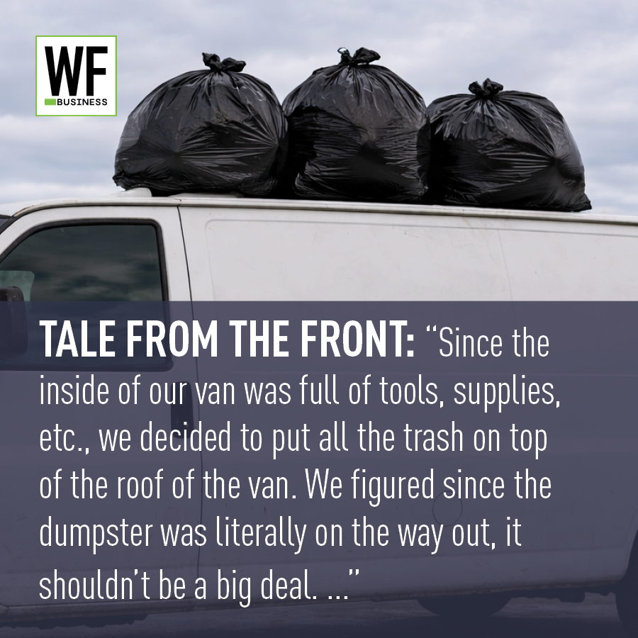 Van with three black trash bags on roof, WF Business logo in corner