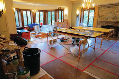 Once protected, the billiard room provided a workshop for stripping doors and storage space for building materials.