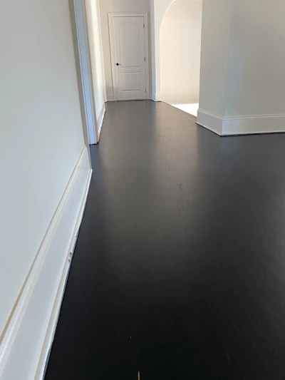 It’s up to you, the expert, to use your knowledge to say yes or no to the customer when they want something that may not work in their home. This black-stained floor wouldn’t be a good choice if they keep the house hot and dry and will have gaps.
