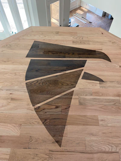 Creating a stain sample tailored to the specific likes and taste of the customer can give them a more personal experience—for this job, my samples replicated the logo of the greatest NFL team in the NFC South (my editor disagrees with that last part).