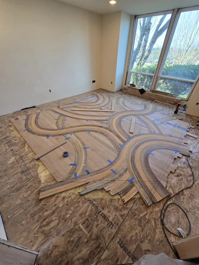 Ragalie made 3¼-inch white oak panels on site then hand-cut them and sanded them to fit with the curves.