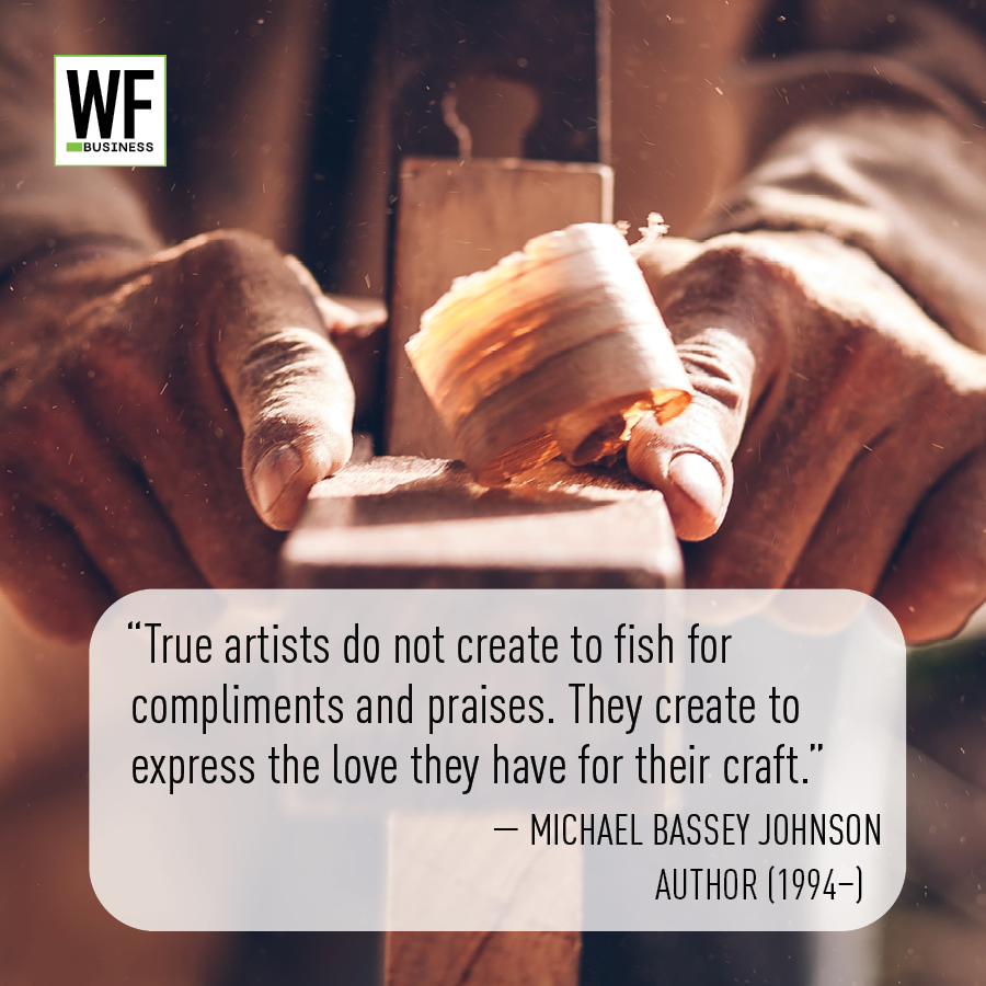 Hands holding amber glass jar with WF Business logo and Michael Bassey Johnson quote about true artists creating from love of craft