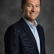 Paul F. De Cock will take over as CEO of Mohawk Industries September 30.