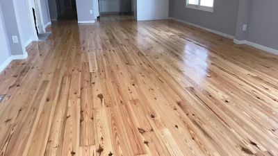 Before a property sells, refinishing an existing wood floor (like we did on this natural heart pine floor) offers the same value as replacing it.