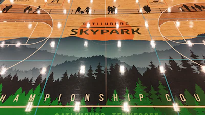 The SkyPark/SkyBridge championship court features life-size human silhouettes looking out at the iconic view from SkyBridge in Gatlinburg, Tenn.
