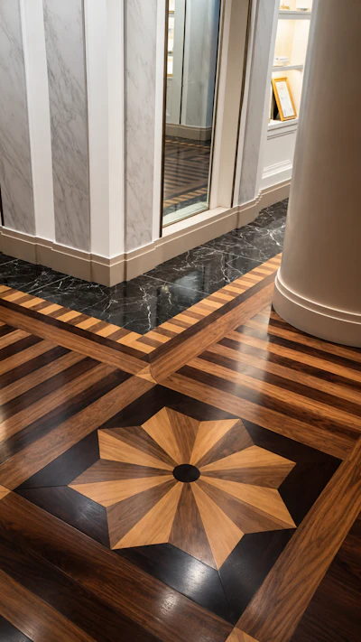 Wood flooring manufacturer BoardHouse (Los Angeles) hand-finished all the tiny pieces of French oak, domestic black walnut and cherry before shipping them to New York City for installation.