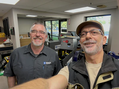 On his 2025 visit to the U.S., Vallant first stopped at EMack Manufacturing in the Grand Rapids, Mich., area to see where the Ryder Cart systems are made. Here he is (at right) with EMack Vice President Eric Downing.