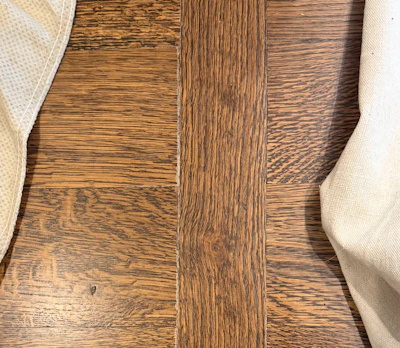 White lines along board edges are one common result from not waiting long enough for stain to dry before coating.
