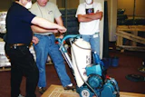 Todd McDonald (center) teaches at an NWFA school in St. Louis in December 2000.