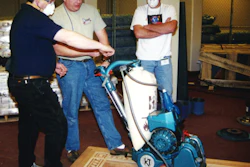 Todd McDonald (center) teaches at an NWFA school in St. Louis in December 2000.